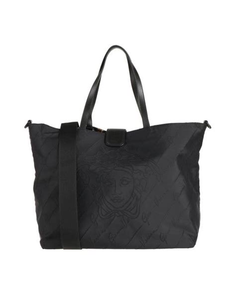 black versace diaper bag|Versace baby diaper bag.